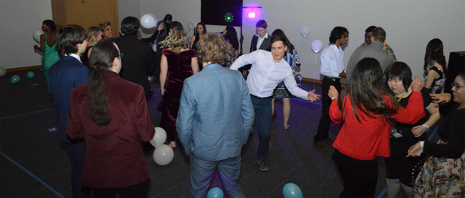 Centennial Residences on the dance floor at a gala event.