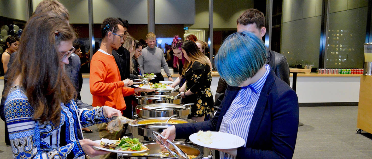 Centennial Residences having dinner at a gala event.